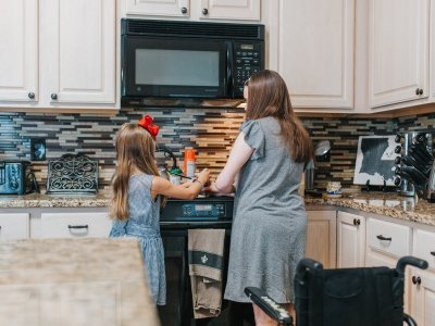 Canva - Mother and Daughter Cooking.jpg