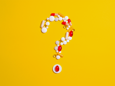 Canva - Medication Pills Isolated on Yellow background (1).png